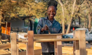 Tebogo proudly presents her woodworking products in Katima Mulilo